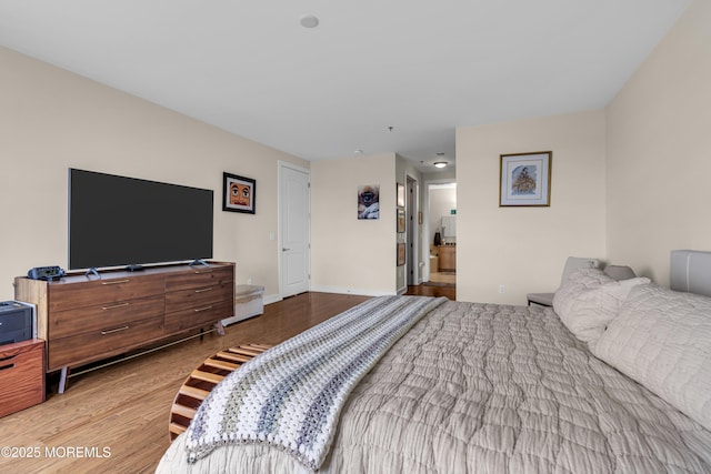 432 Ocean Blvd N Unit 506, Long Branch, NJ 07740 - bedroom with wood finished floors and baseboards