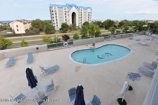 432 Ocean Blvd N Unit 506, Long Branch, NJ 07740 - community pool featuring a patio
