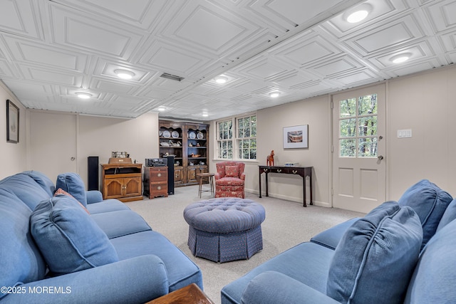 49 Crane Ct, Middletown, NJ 07748 - carpeted living area with plenty of natural light, an ornate ceiling, built in shelves, and baseboards