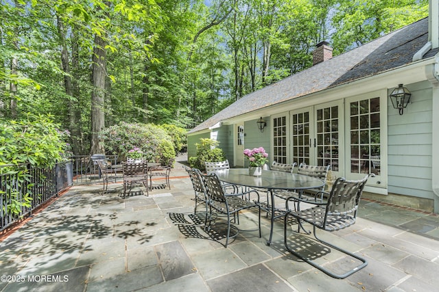 49 Crane Ct, Middletown, NJ 07748 - view of patio with outdoor dining space and french doors