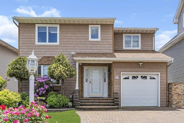 221 Bay Stream Dr, Toms River, NJ 08753 - view of front of house featuring a garage, decorative driveway, and a shingled roof