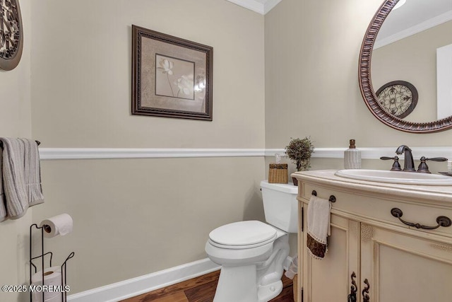 221 Bay Stream Dr, Toms River, NJ 08753 - bathroom featuring crown molding, wood finished floors, toilet, vanity, and baseboards