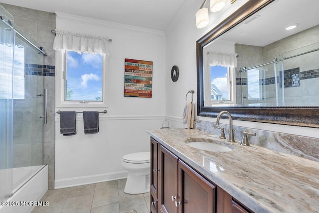221 Bay Stream Dr, Toms River, NJ 08753 - full bath featuring vanity, toilet, tile patterned flooring, ornamental molding, and enclosed tub / shower combo