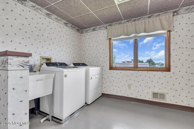 221 Bay Stream Dr, Toms River, NJ 08753 - laundry area featuring wallpapered walls, washer and dryer, and baseboards