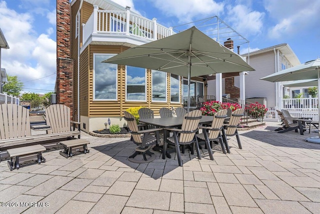 221 Bay Stream Dr, Toms River, NJ 08753 - view of patio / terrace featuring outdoor dining area and a balcony