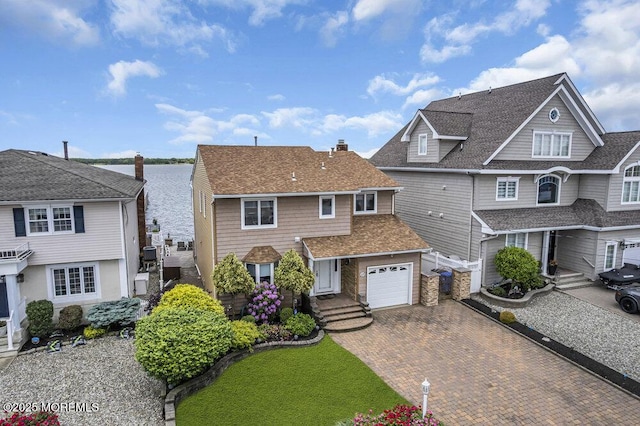 221 Bay Stream Dr, Toms River, NJ 08753 - view of front of property featuring decorative driveway, roof with shingles, and a garage