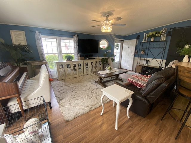 89 Seattle Slew Dr, Howell, NJ 07731 - living area with ceiling fan, ornamental molding, and wood finished floors