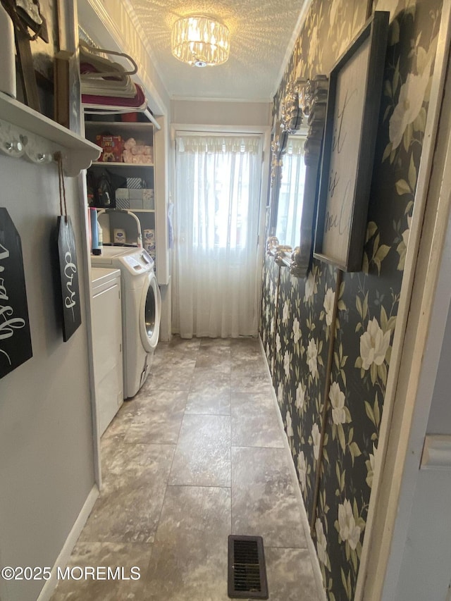 89 Seattle Slew Dr, Howell, NJ 07731 - laundry room featuring washing machine and dryer, wallpapered walls, and baseboards