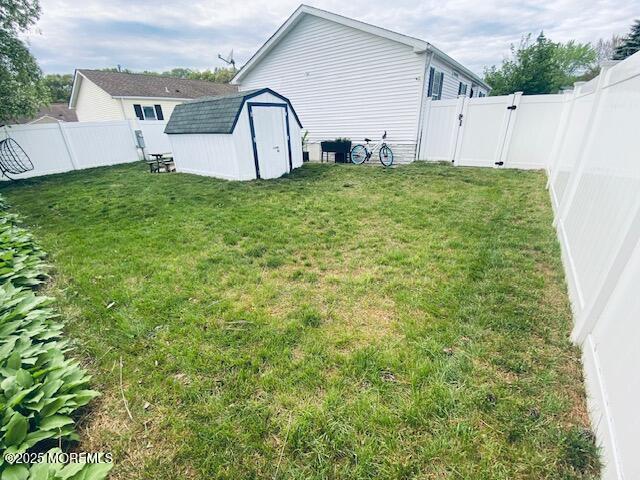 89 Seattle Slew Dr, Howell, NJ 07731 - view of yard featuring a gate