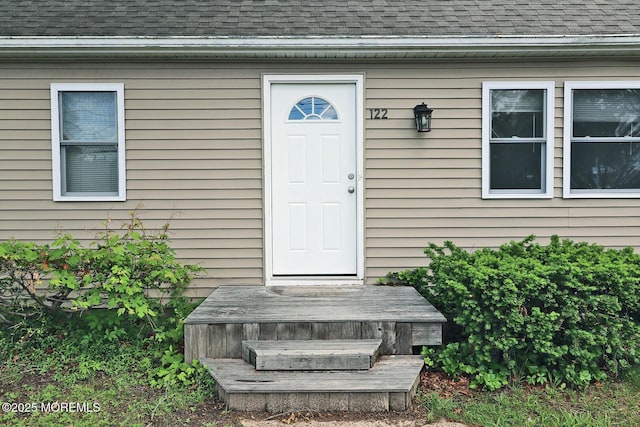 122 Oakwood Pl, Forked River, NJ 08731 - doorway to property featuring a shingled roof