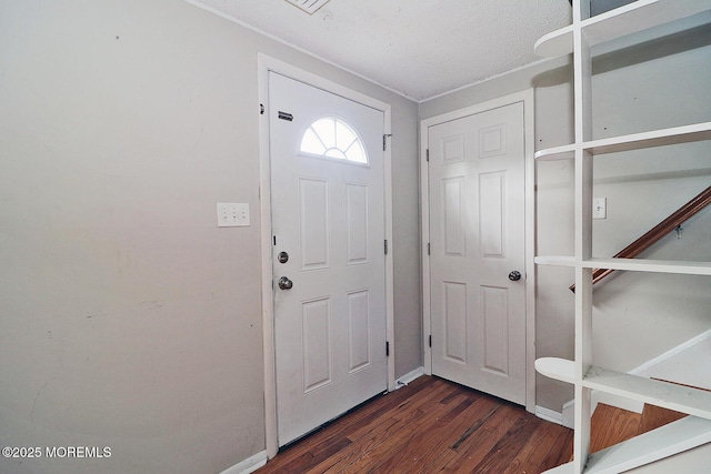 122 Oakwood Pl, Forked River, NJ 08731 - foyer entrance featuring wood finished floors, baseboards, and a textured ceiling