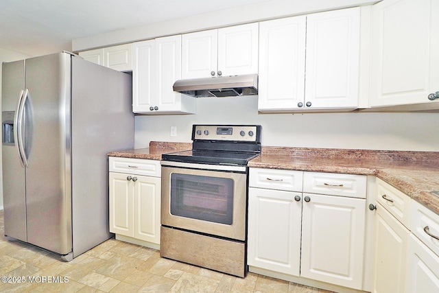 122 Oakwood Pl, Forked River, NJ 08731 - kitchen with under cabinet range hood, appliances with stainless steel finishes, white cabinets, and stone finish flooring