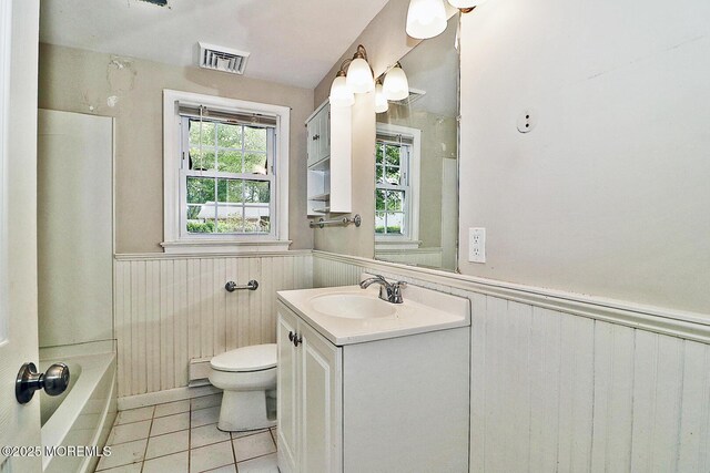 122 Oakwood Pl, Forked River, NJ 08731 - full bath with a bathtub, vanity, a wainscoted wall, toilet, and a baseboard radiator