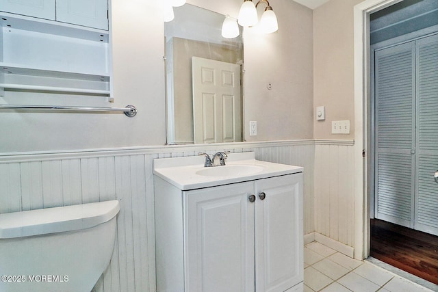 122 Oakwood Pl, Forked River, NJ 08731 - bathroom with toilet, a wainscoted wall, vanity, and tile patterned floors