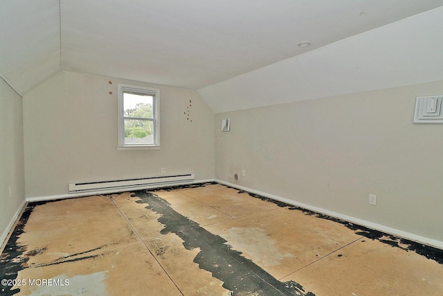 122 Oakwood Pl, Forked River, NJ 08731 - additional living space with a baseboard heating unit and vaulted ceiling