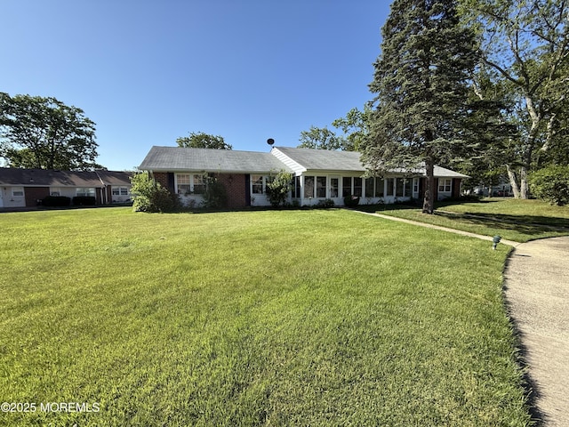 1134A Argyll Cir, Lakewood, NJ 08701 - ranch-style home featuring a front yard and brick siding