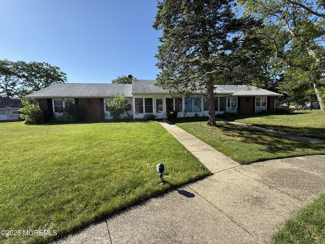 1134A Argyll Cir, Lakewood, NJ 08701 - ranch-style house with a front yard and brick siding