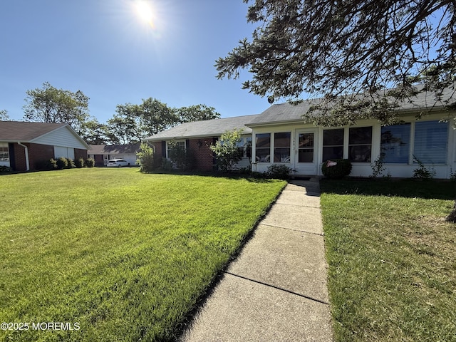 1134A Argyll Cir, Lakewood, NJ 08701 - ranch-style house featuring a front yard and a shingled roof