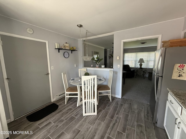 1134A Argyll Cir, Lakewood, NJ 08701 - dining area featuring dark wood-type flooring and baseboards