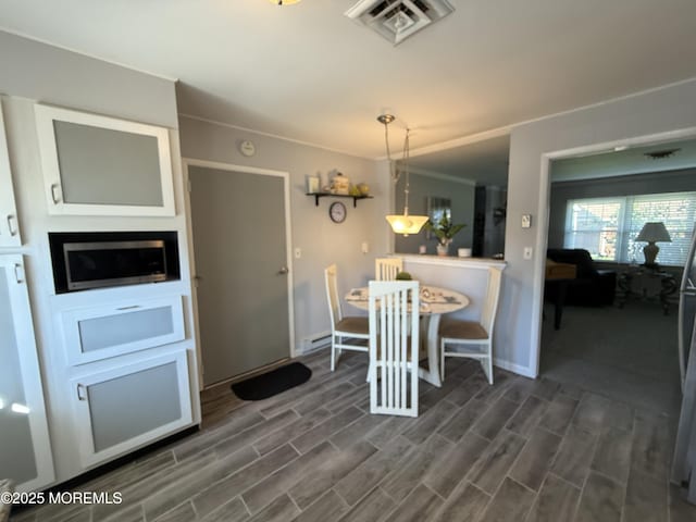 1134A Argyll Cir, Lakewood, NJ 08701 - dining room featuring dark wood-style flooring and baseboards
