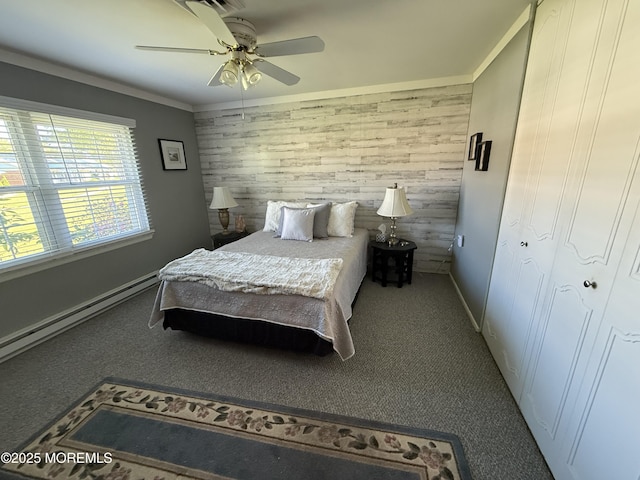 1134A Argyll Cir, Lakewood, NJ 08701 - carpeted bedroom featuring wooden walls, baseboard heating, ornamental molding, ceiling fan, and baseboards