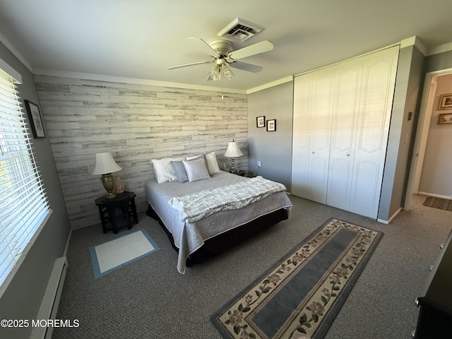1134A Argyll Cir, Lakewood, NJ 08701 - carpeted bedroom featuring a baseboard heating unit, crown molding, and ceiling fan