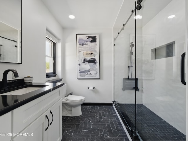 50 Locust Ct, Freehold, NJ 07728 - bathroom featuring toilet, vanity, a stall shower, and recessed lighting