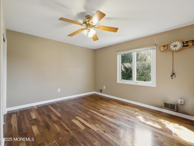 50 Locust Ct, Freehold, NJ 07728 - spare room with wood finished floors, ceiling fan, and baseboards