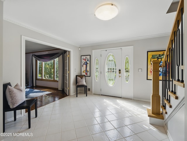 50 Locust Ct, Freehold, NJ 07728 - tiled foyer with stairway, ornamental molding, and baseboards