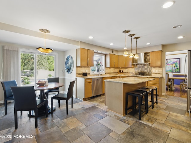 50 Locust Ct, Freehold, NJ 07728 - kitchen featuring stainless steel dishwasher, wall chimney exhaust hood, plenty of natural light, a sink, and recessed lighting