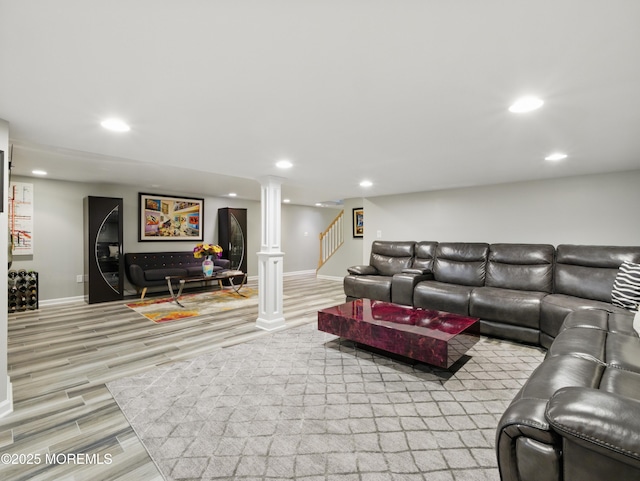 50 Locust Ct, Freehold, NJ 07728 - living area featuring light wood finished floors, baseboards, recessed lighting, and stairway