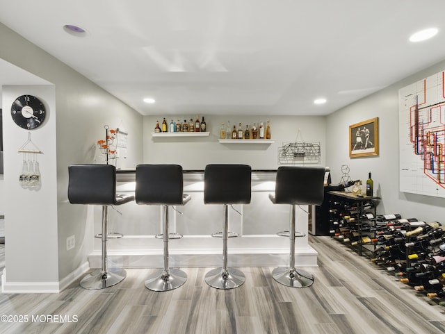 50 Locust Ct, Freehold, NJ 07728 - indoor dry bar with wood finished floors, recessed lighting, and baseboards