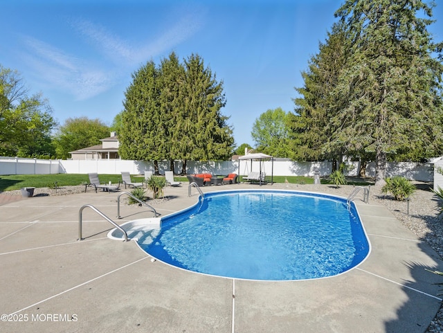 50 Locust Ct, Freehold, NJ 07728 - view of swimming pool featuring a fenced backyard and a patio