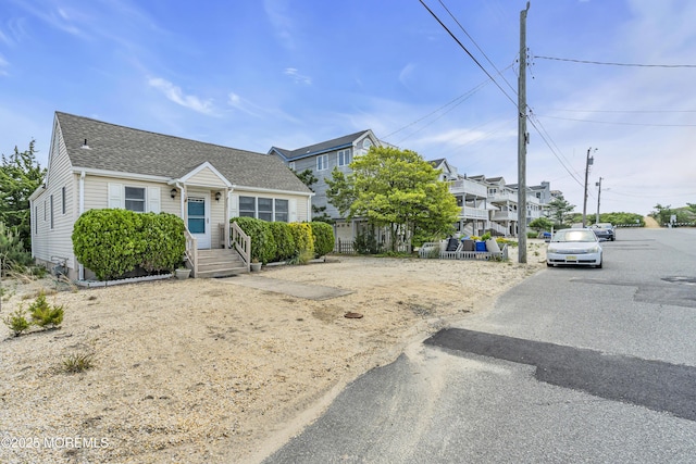 37 N 4th St, Surf City, NJ 08008 - view of front facade with roof with shingles