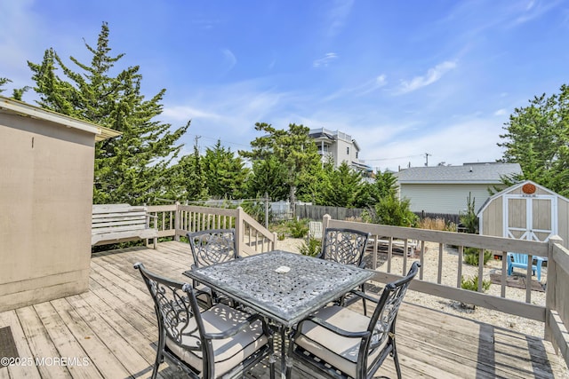 37 N 4th St, Surf City, NJ 08008 - wooden terrace with outdoor dining space and a fenced backyard