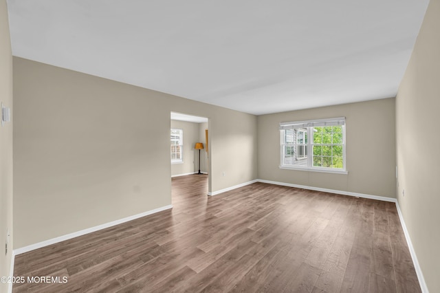 40 Everest Dr N, Brick, NJ 08724 - spare room featuring wood finished floors, healthy amount of natural light, and baseboards