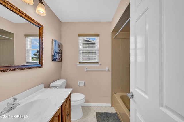 40 Everest Dr N, Brick, NJ 08724 - full bath with healthy amount of natural light, toilet, vanity, and tile patterned flooring