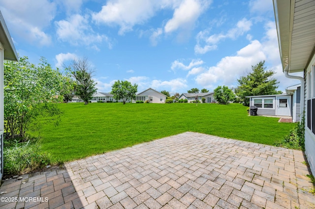 40 Everest Dr N, Brick, NJ 08724 - view of grassy yard with a patio and a residential view