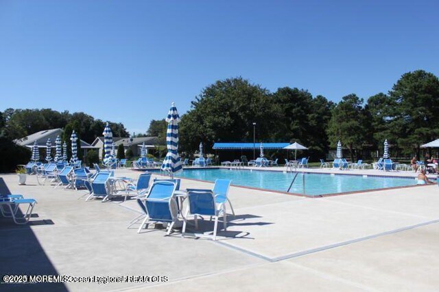 40 Everest Dr N, Brick, NJ 08724 - community pool featuring a patio