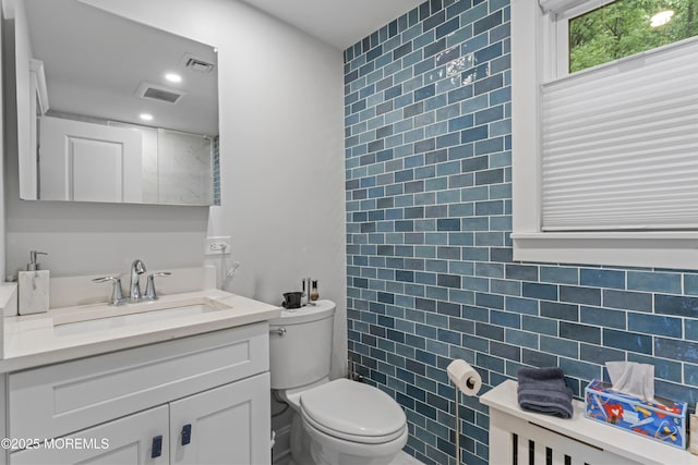 116 Manor Dr, Red Bank, NJ 07701 - full bathroom featuring vanity, toilet, and tile walls