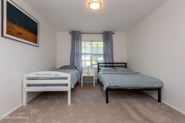 65C Dorchester Dr, Lakewood, NJ 08701 - carpeted bedroom featuring baseboards