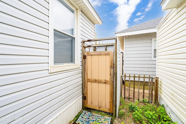 10 Brunswick Place, Point Pleasant Beach, NJ 08742 - property entrance with roof with shingles