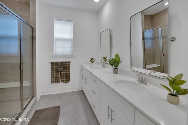 69 Starlight Dr, Monroe, NJ 08831 - full bath featuring double vanity, a shower stall, tile patterned flooring, recessed lighting, and baseboards