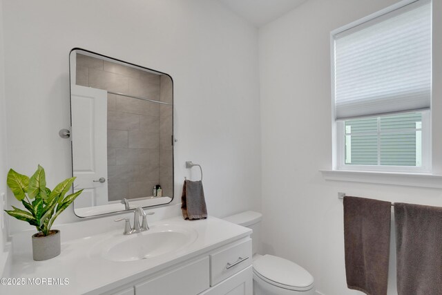 69 Starlight Dr, Monroe, NJ 08831 - bathroom featuring toilet, vanity, and a shower