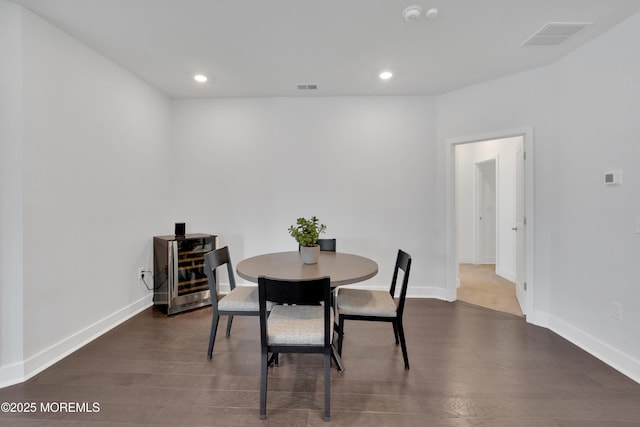 69 Starlight Dr, Monroe, NJ 08831 - dining area with dark wood-style flooring, wine cooler, recessed lighting, and baseboards