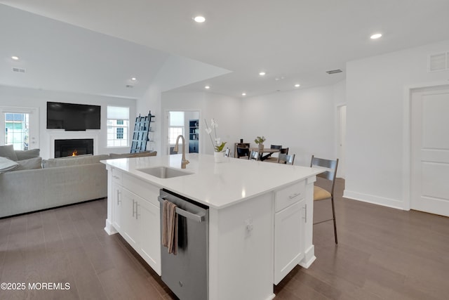 69 Starlight Dr, Monroe, NJ 08831 - kitchen featuring stainless steel dishwasher, a sink, healthy amount of natural light, white cabinets, and recessed lighting