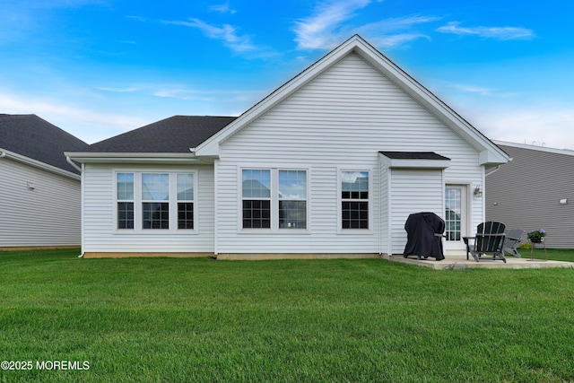 69 Starlight Dr, Monroe, NJ 08831 - rear view of house with a patio area and a yard