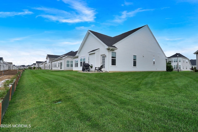69 Starlight Dr, Monroe, NJ 08831 - back of property with a yard, a residential view, and a patio area