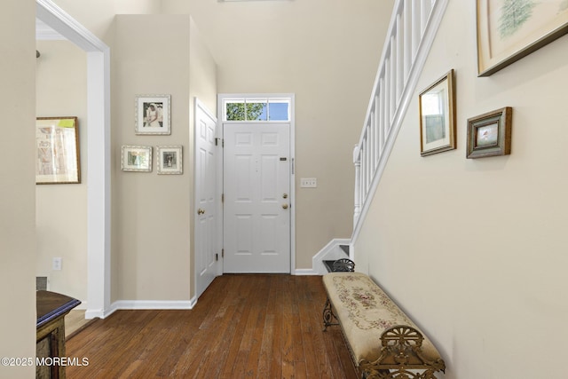 2060 Benjamin Cir, Wall, NJ 07719 - foyer featuring dark wood-type flooring, stairs, baseboards, and a towering ceiling