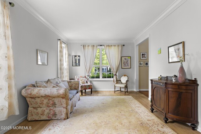 2060 Benjamin Cir, Wall, NJ 07719 - living area featuring wood finished floors, ornamental molding, and baseboards
